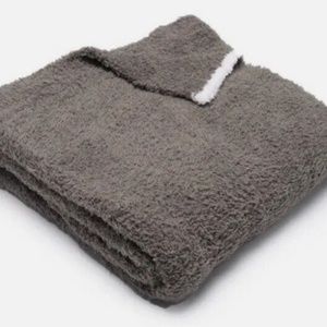 Cozy Barefoot Dreams throw blanket